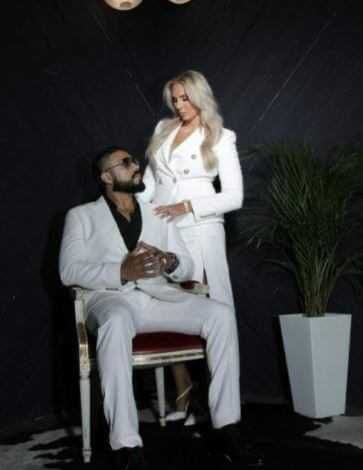 Riki Johnson ex wife Charlotte Flair with her fiance Andrade.